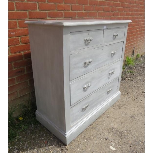 725 - An oak chest, painted grey and distressed, housing two short above three long graduated oak-lined dr... 