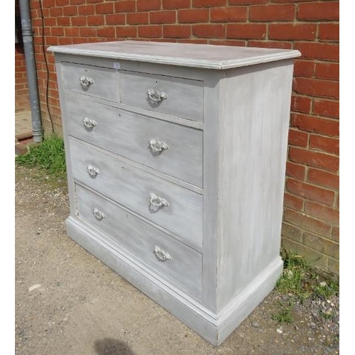 725 - An oak chest, painted grey and distressed, housing two short above three long graduated oak-lined dr... 