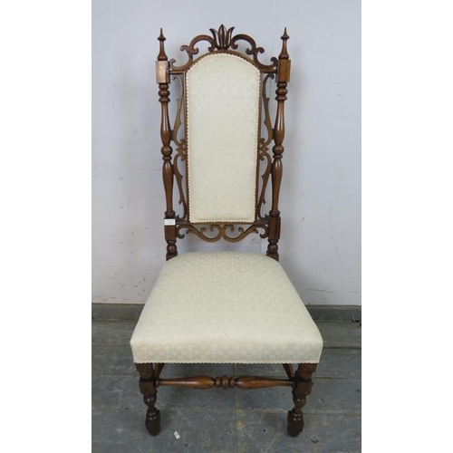 732 - A 19th century rosewood high back hall chair, the carved and pierced back with turned finials and tu... 