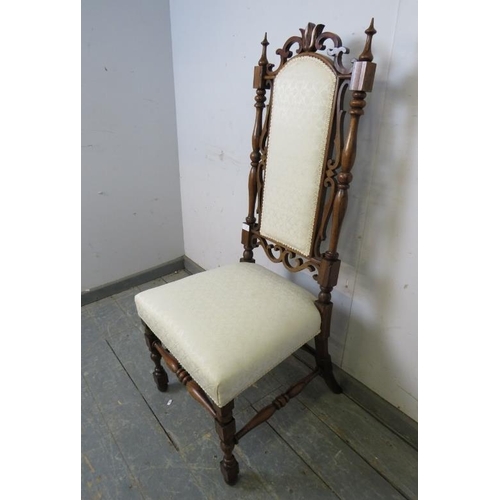 732 - A 19th century rosewood high back hall chair, the carved and pierced back with turned finials and tu... 