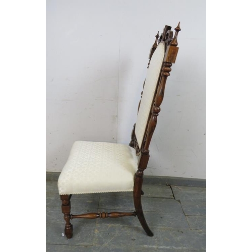 732 - A 19th century rosewood high back hall chair, the carved and pierced back with turned finials and tu... 