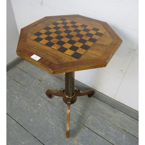 736 - A 19th century rosewood octagonal games table, having inlaid ebony and burr walnut chessboard top, t... 