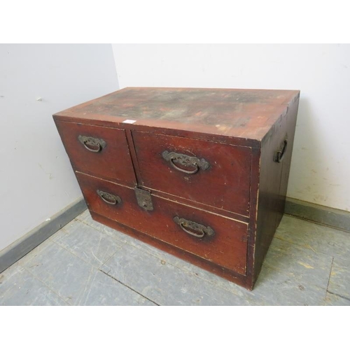 745 - An antique Meiji Period Japanese tansu chest, having two short above one long drawer with pierced ca... 