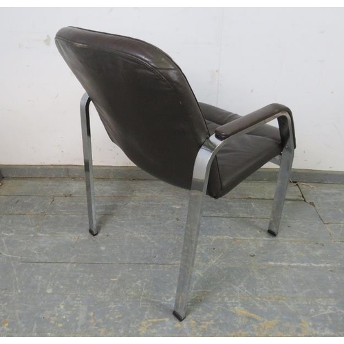 747 - A vintage desk chair by Klober, upholstered in supple brown leather, on chrome supports. 
H85cm W61c... 