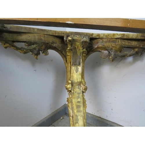 750 - A 19th century French giltwood console table, the loose white marble top on a giltwood base with pro... 