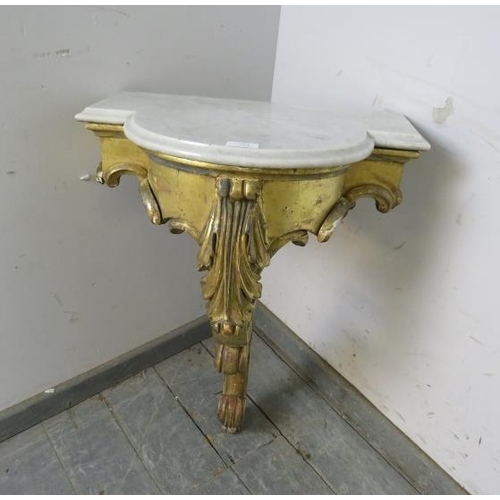 751 - A 19th century French giltwood console table, the shaped white marble loose top on a giltwood base w... 