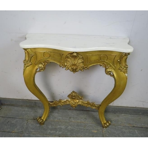 752 - A vintage French giltwood console table, the white marble serpentine top on an ornate giltwood base ... 