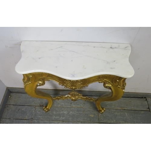 752 - A vintage French giltwood console table, the white marble serpentine top on an ornate giltwood base ... 