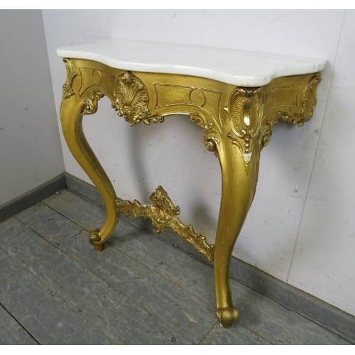 752 - A vintage French giltwood console table, the white marble serpentine top on an ornate giltwood base ... 