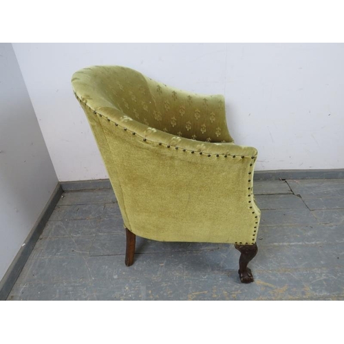 758 - An antique mahogany tub chair in the Georgian taste, upholstered in patterned material with brass st... 