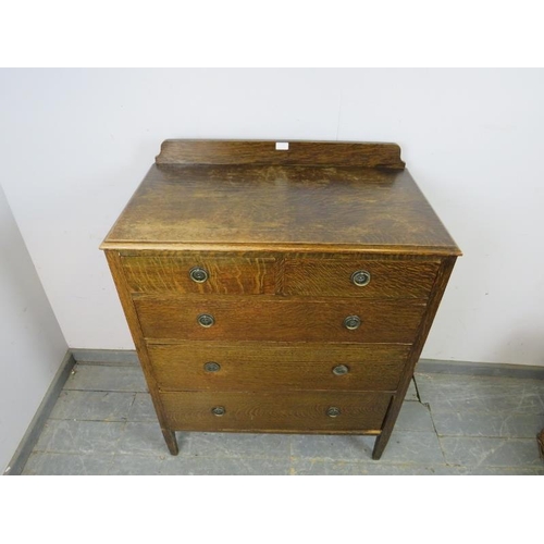 767 - An Edwardian quartersawn oak chest, housing two short above three long graduated oak-lined drawers w... 