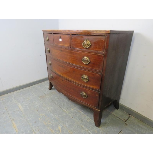 777 - A George III mahogany bow-fronted chest strung with boxwood, housing three short above three long gr... 