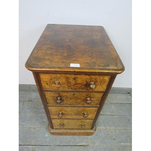 778 - A Victorian figured walnut pedestal cabinet housing four graduated drawers with turned wooden handle... 