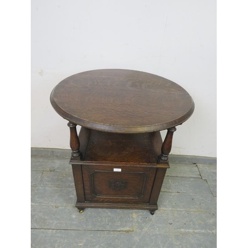 785 - An antique oak metamorphic monk’s chair/occasional table in the 17th century taste, the circular bac... 