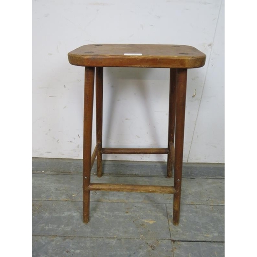 799 - A vintage stained pine artist’s stool, on canted supports with stretchers. 
H60cm W33cm D20cm (appro... 