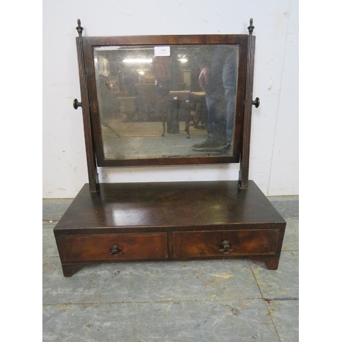 800 - A Regency Period mahogany swing vanity mirror, retaining the original nicely silvered bevelled plate... 