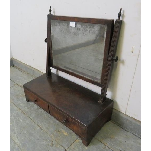 800 - A Regency Period mahogany swing vanity mirror, retaining the original nicely silvered bevelled plate... 