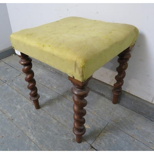 802 - A small 19th century walnut stool, upholstered in pale yellow damask, on tapering barley twist suppo... 