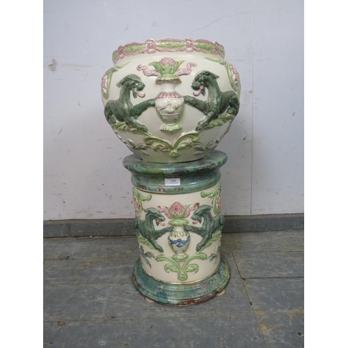 804 - An antique ceramic jardinière on stand in the Classical taste, having relief decoration depicting ch... 