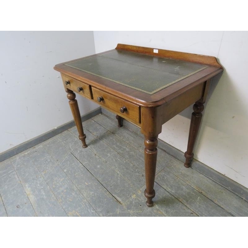 837 - A Victorian walnut writing table, the rear gallery above an inset brown leather writing surface with... 