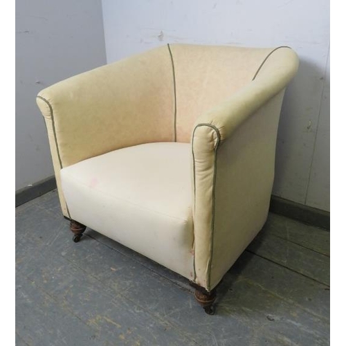 840 - A 19th century tub chair upholstered in calico with green piping, on ball feet with steel castors. 
... 