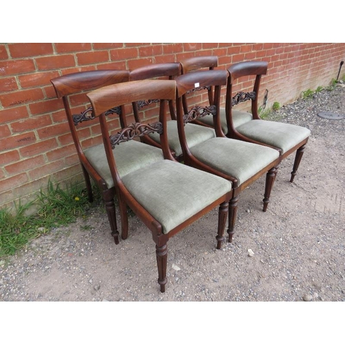 855 - A set of six Victorian rosewood dining chairs, having ornately carved and pierced backs, above drop ... 