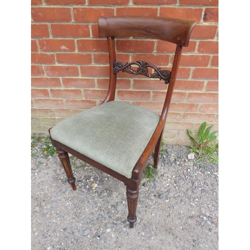 855 - A set of six Victorian rosewood dining chairs, having ornately carved and pierced backs, above drop ... 