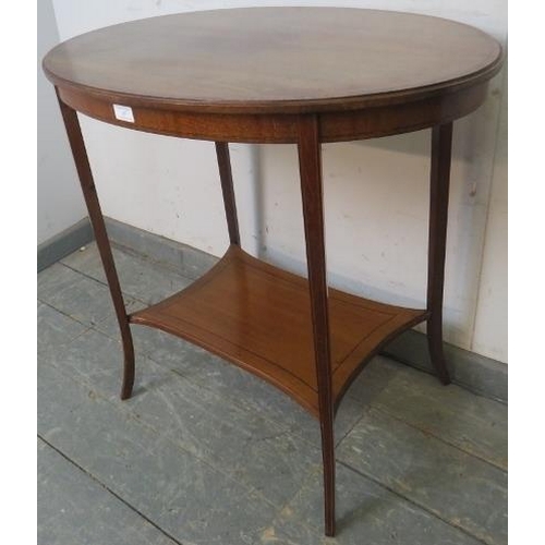 856 - An Edwardian mahogany oval occasional table, crossbanded and parquetry strung, on tapering square ou... 