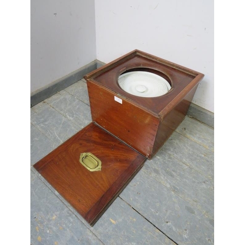 865 - A 19th century mahogany campaign ‘thunderbox’ having brass carry handles and original ceramic liner ... 