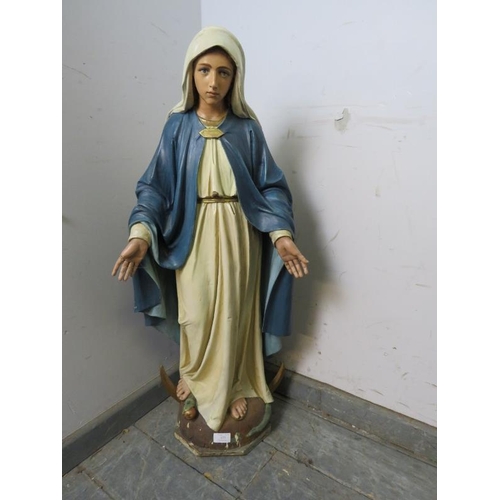 873 - A vintage painted plaster statue of the Madonna, on a plinth base. 
H86cm W38cm D23cm (approx). 
Con... 