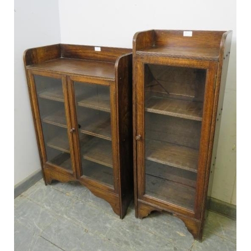 881 - Two vintage oak glazed bookcases, with ¾ galleries, housing two and three shelves respectively, on b... 