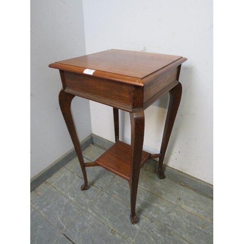 882 - An antique mahogany square lamp table, on cabriole supports united by a braced undertier. 
H74cm W40... 