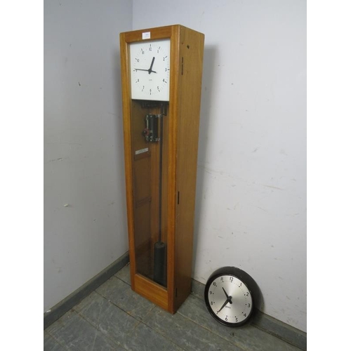 884 - A vintage beech cased electric wall clock set by Gent of Leicester, comprising a master clock with p... 