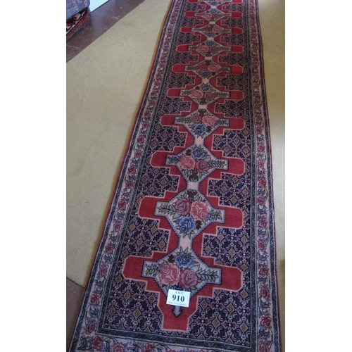 910 - North West Persian Senneh runner 10 central interlocking motifs depicting roses on a pink ground 383... 