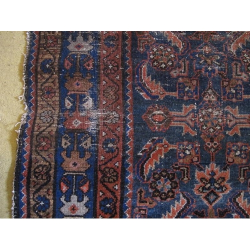 920 - A 19 Century Persian rug. Blue on burnt amber ground 147 x 112cms

Condition report: Some age relate... 