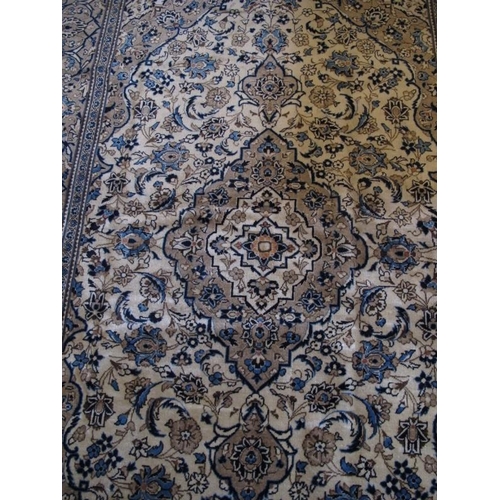 929 - A fine Persian Kashan carpet, central medallion on cream ground with deep borders 293 x 192cms

Cond... 