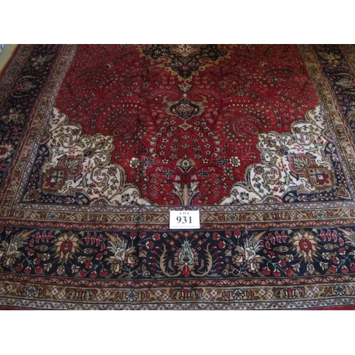 931 - A fine Persian Kashan carpet. Central medallion on red ground. 305 x 79cms

Condition report: Very g... 