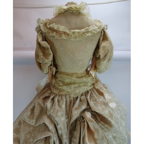 79 - A vintage 1960s Victorian style Crinoline mannequin shop display dummy with gilt metal display shelv... 