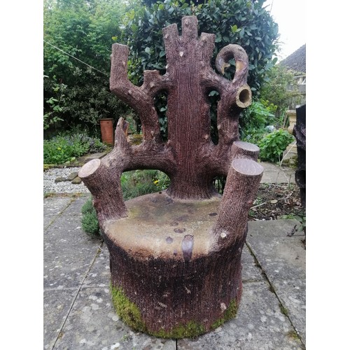 886 - A large 19th century naturalistic stoneware garden seat, modelled as a tree stump with backrest in t... 