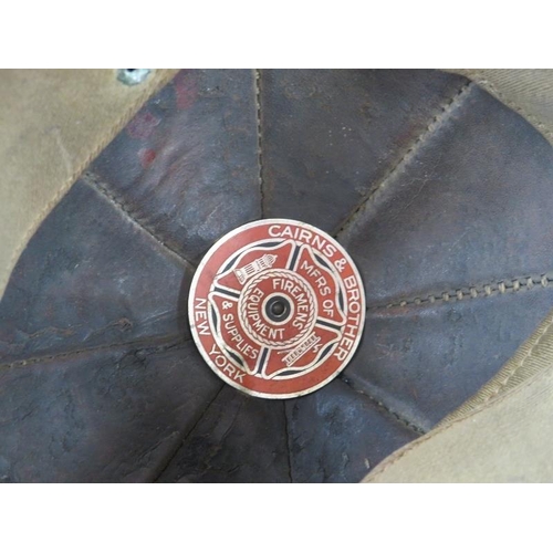 1 - A 1950s US Fire Department (No 1) leather beaver tail helmet with Cairns & Brother label