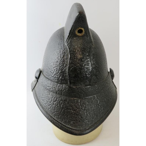 112 - A 1950s British black leather Hendry fire helmet