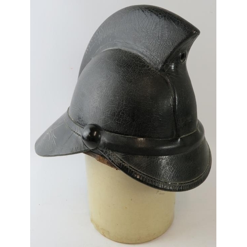 113 - A 1950s British black leather Hendry fire helmet