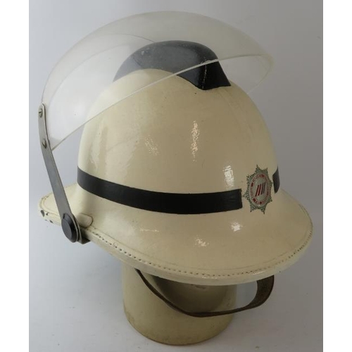 114 - A 1980s British Airports Authority Fire Service white fire helmet with visor.