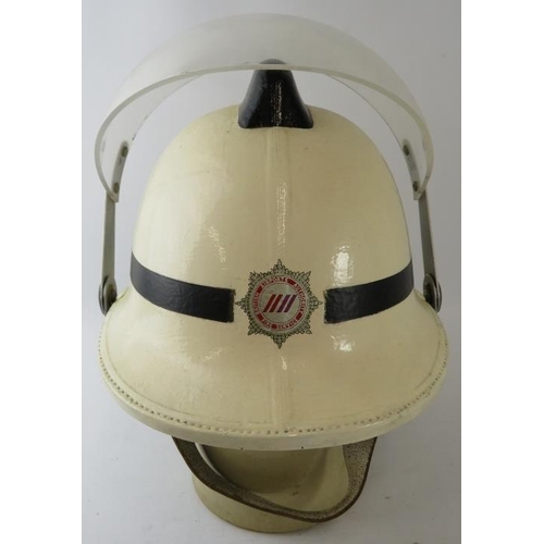 114 - A 1980s British Airports Authority Fire Service white fire helmet with visor.