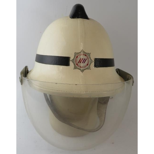 114 - A 1980s British Airports Authority Fire Service white fire helmet with visor.