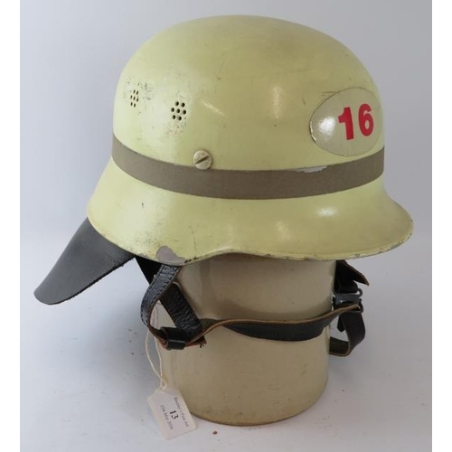 13 - A 1970s West German Hamburg (16) Fire Service white steel helmet with leather neck cowl.