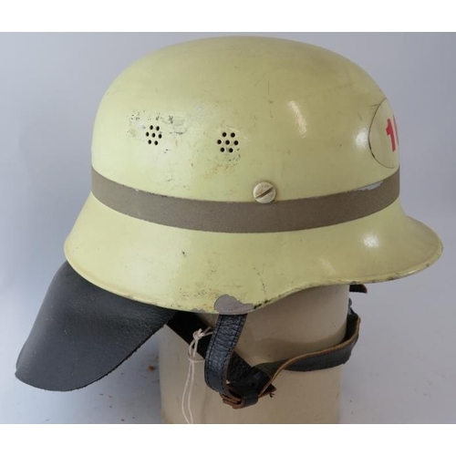 13 - A 1970s West German Hamburg (16) Fire Service white steel helmet with leather neck cowl.