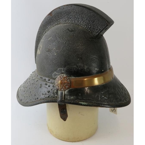 19 - A British 1950s Hendry brass mounted fire helmet with square comb.