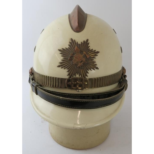 22 - A 1970s Brazilian Fire Service white fire helmet with brass mounts.