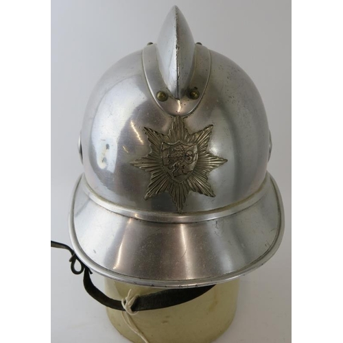 27 - A 1980s Swedish Gothenburg Fire Service polished steel fire helmet.